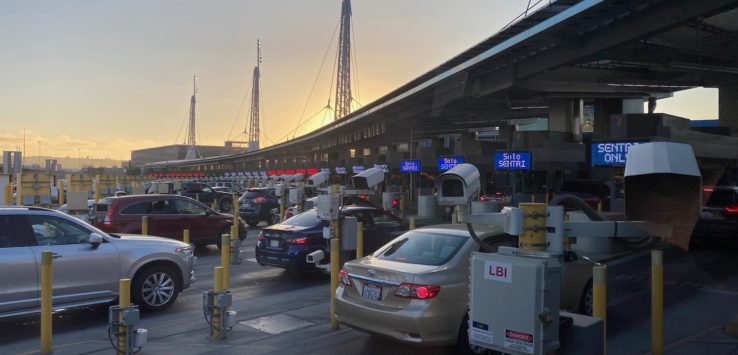 cars parked cars at a toll booth