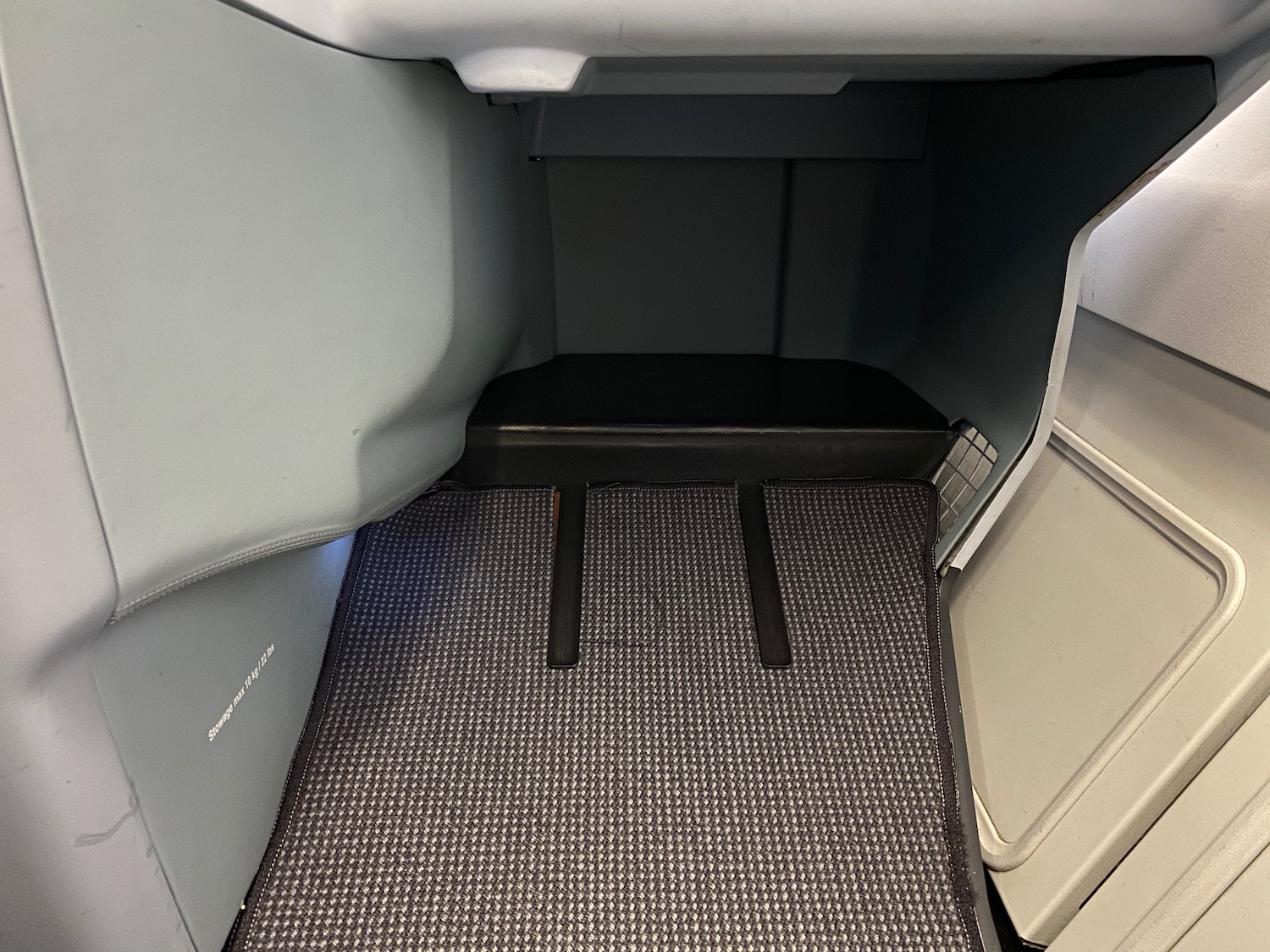 a carpeted floor in an airplane