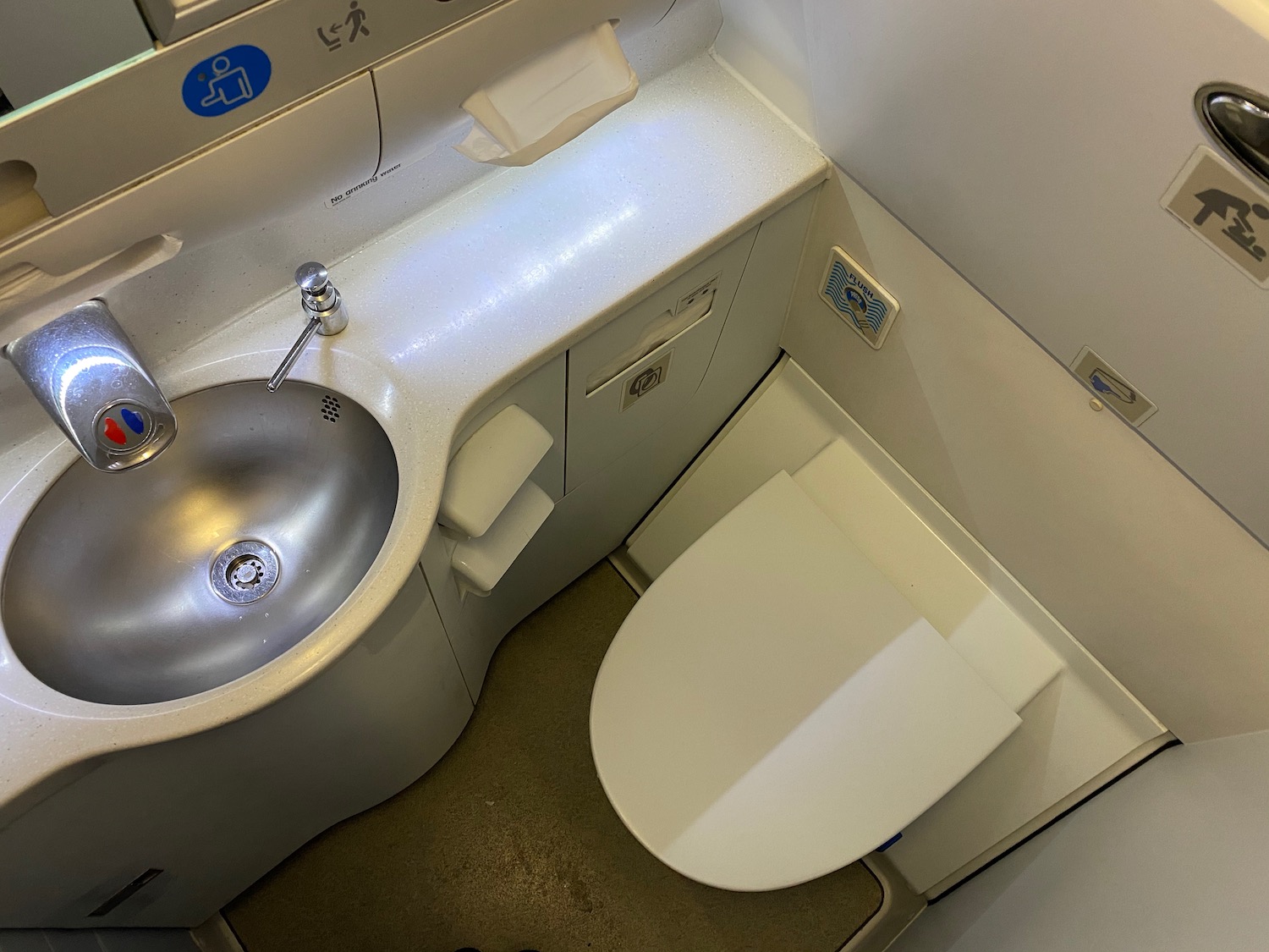 a sink and toilet in a bathroom