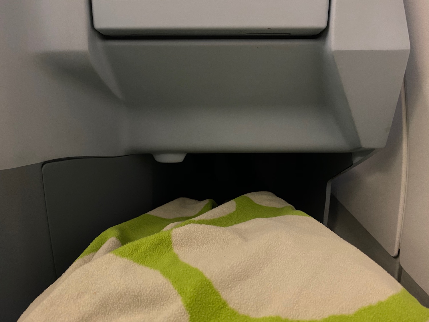 a blanket under a seat