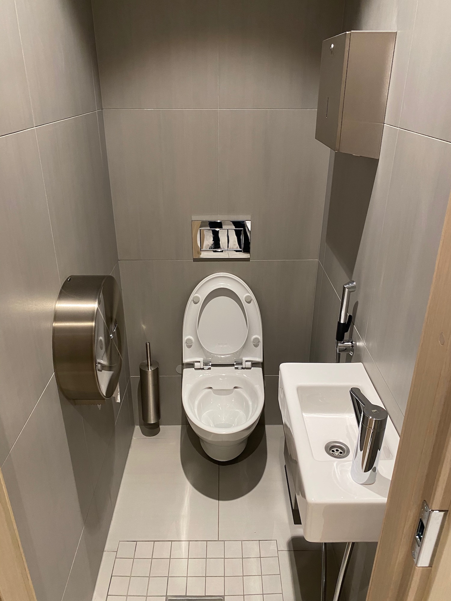 a toilet and sink in a bathroom