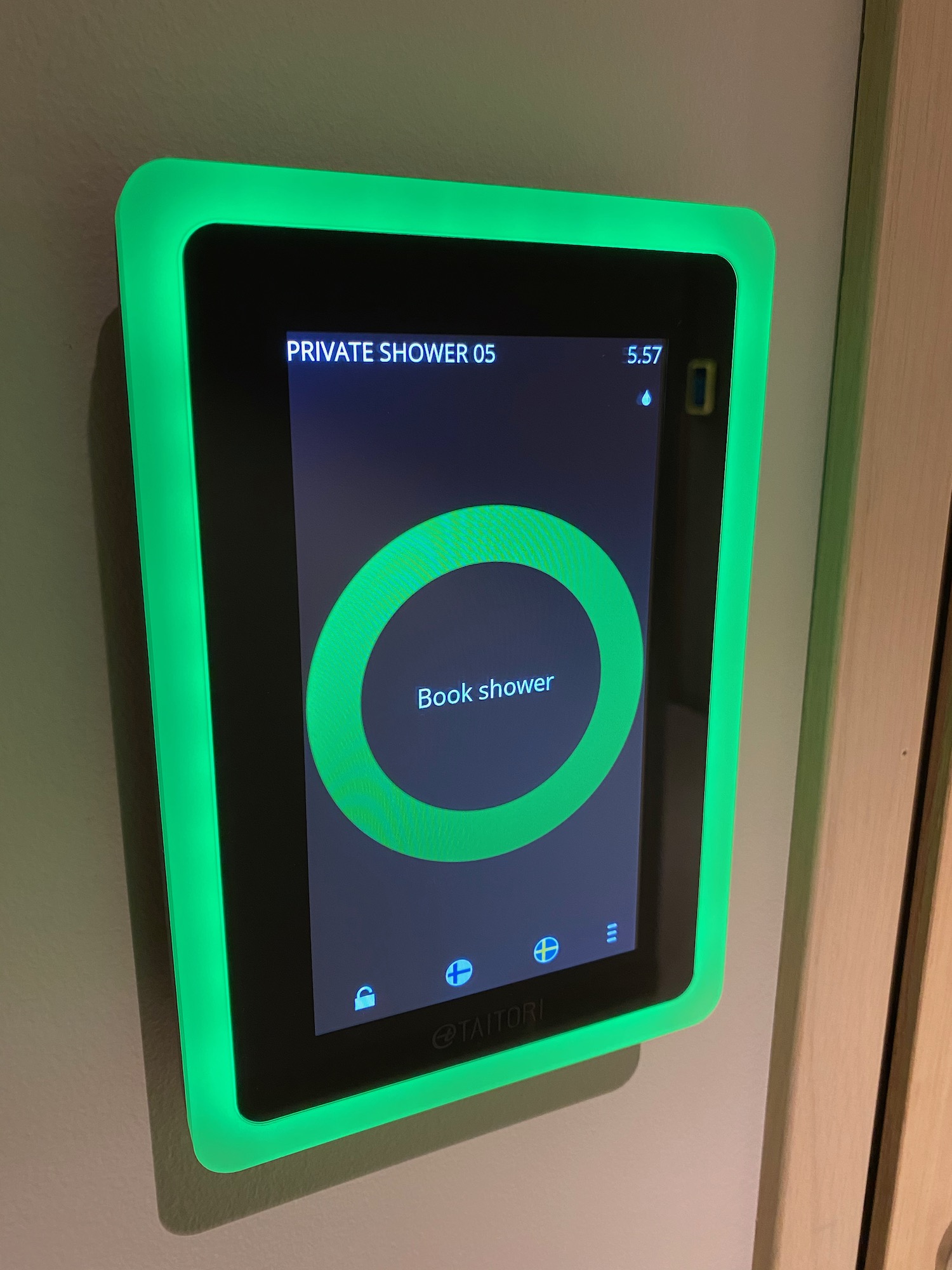 a tablet with green lights on it