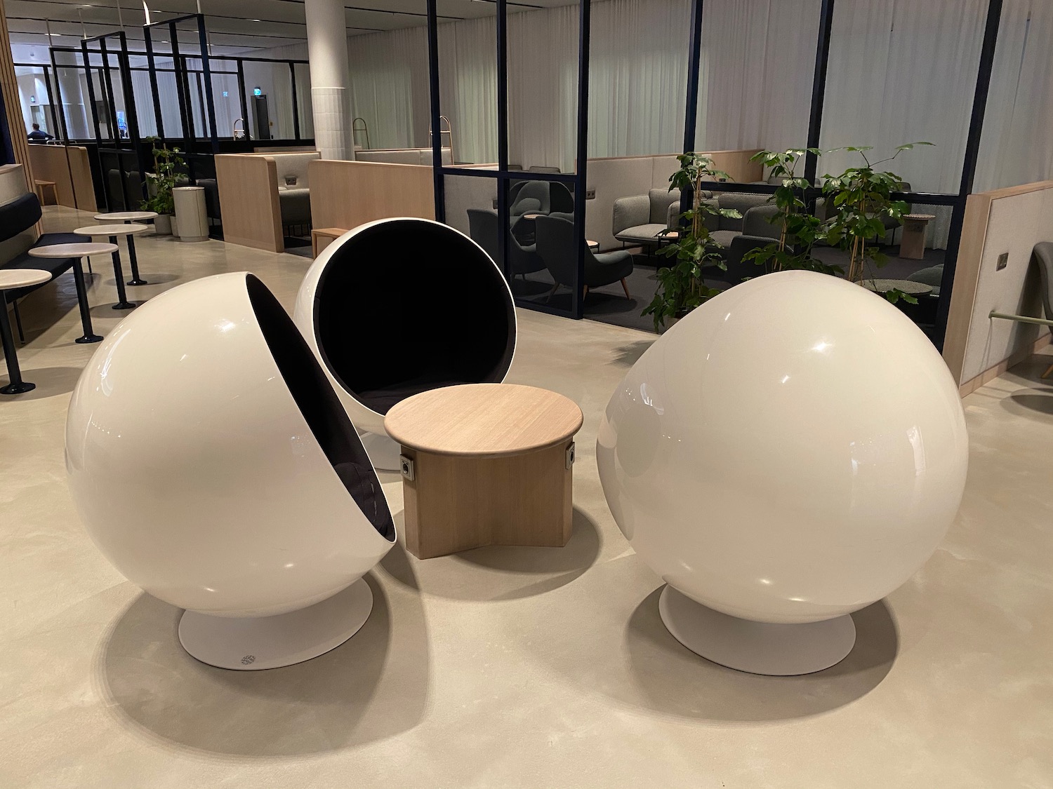 a group of white round objects with a black cover