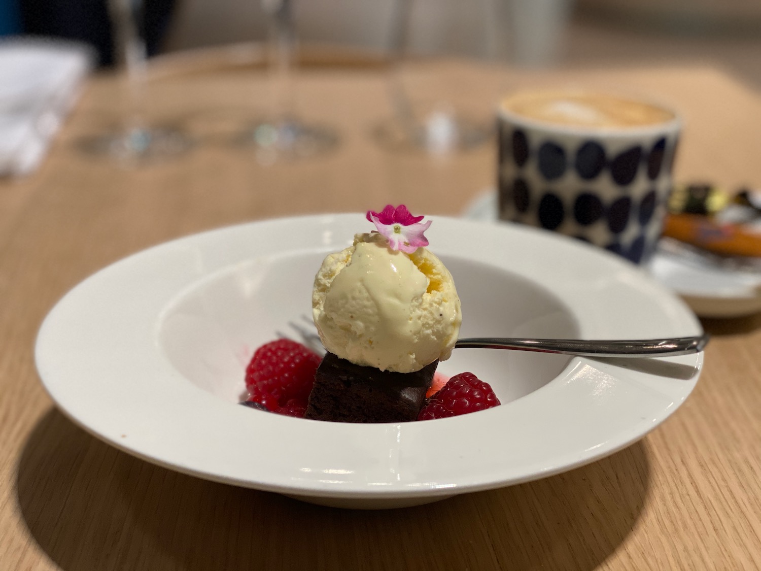 a dessert in a bowl with a spoon