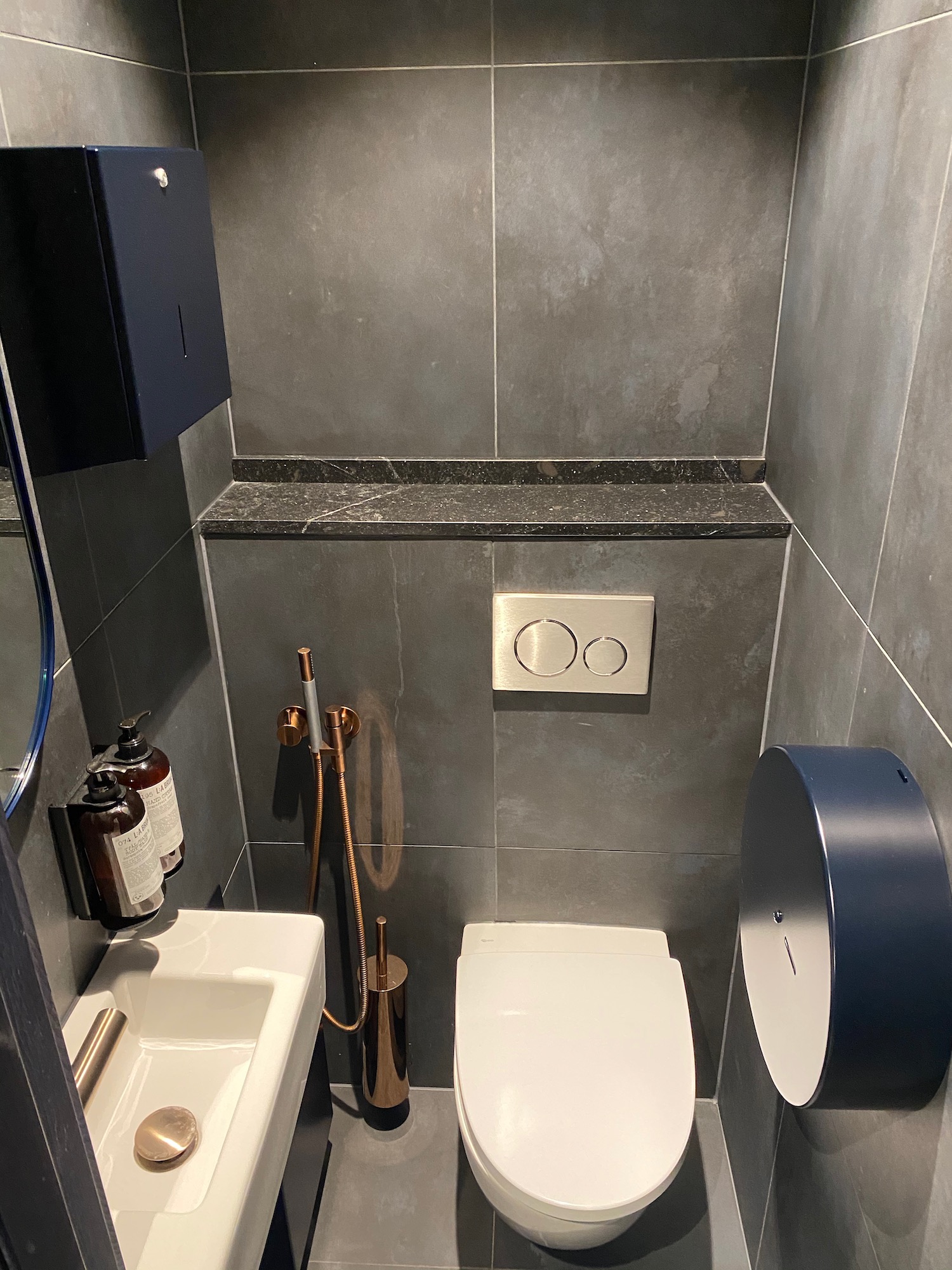 a bathroom with a sink and toilet