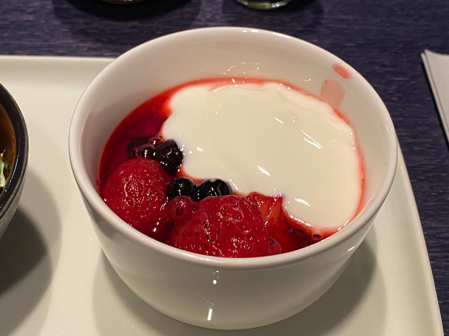 a bowl of fruit and yogurt