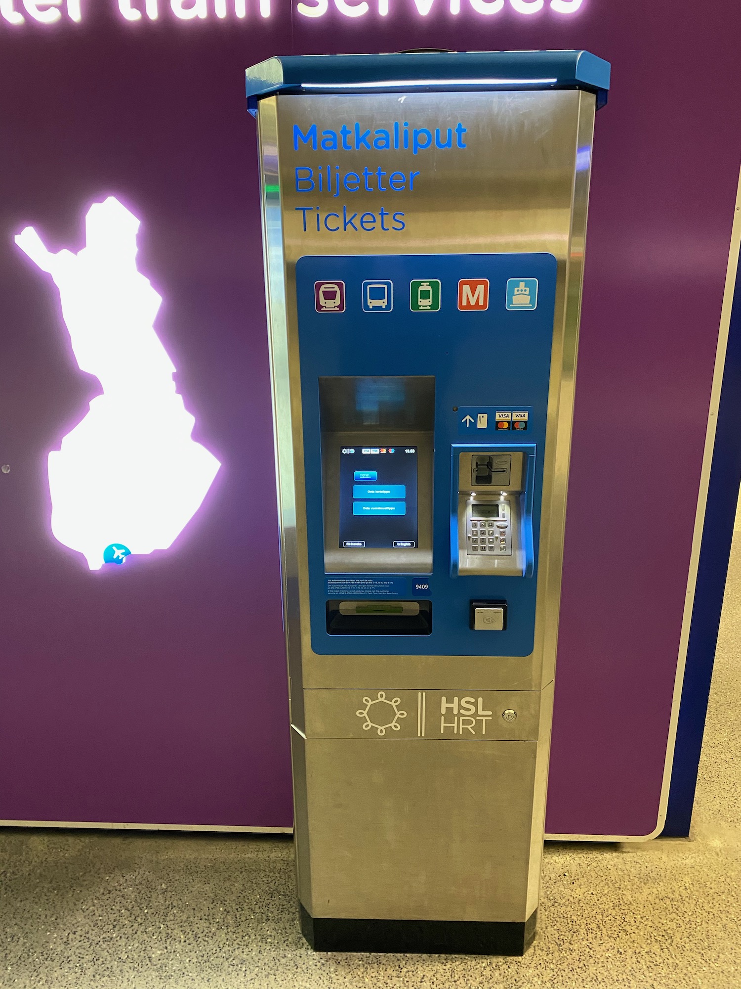 a machine with a purple wall and a map