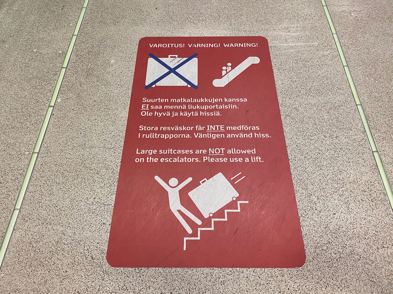 a red sign on the ground
