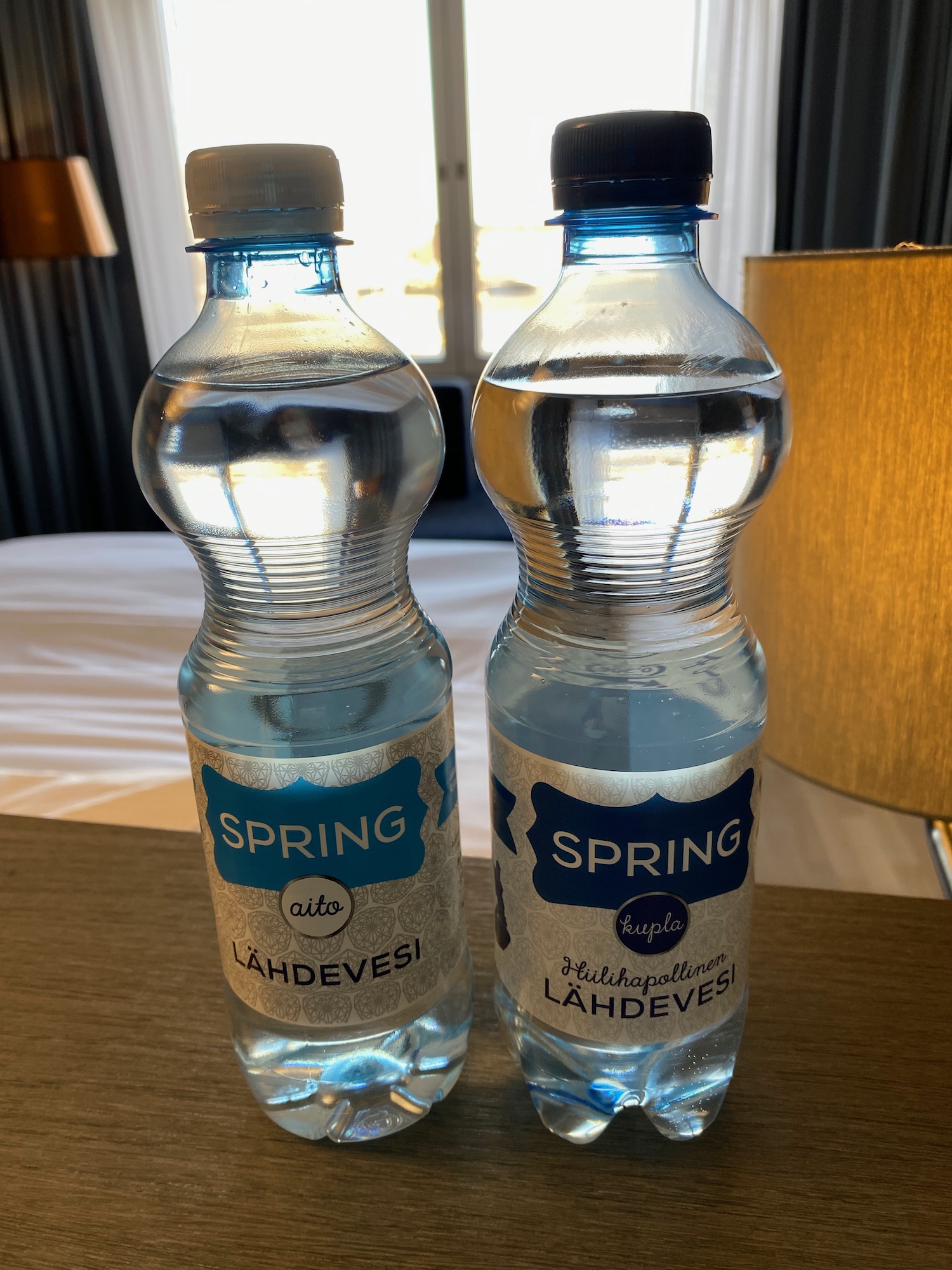 two bottles of water on a table