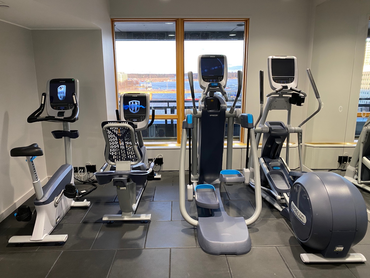 a group of exercise machines in a room