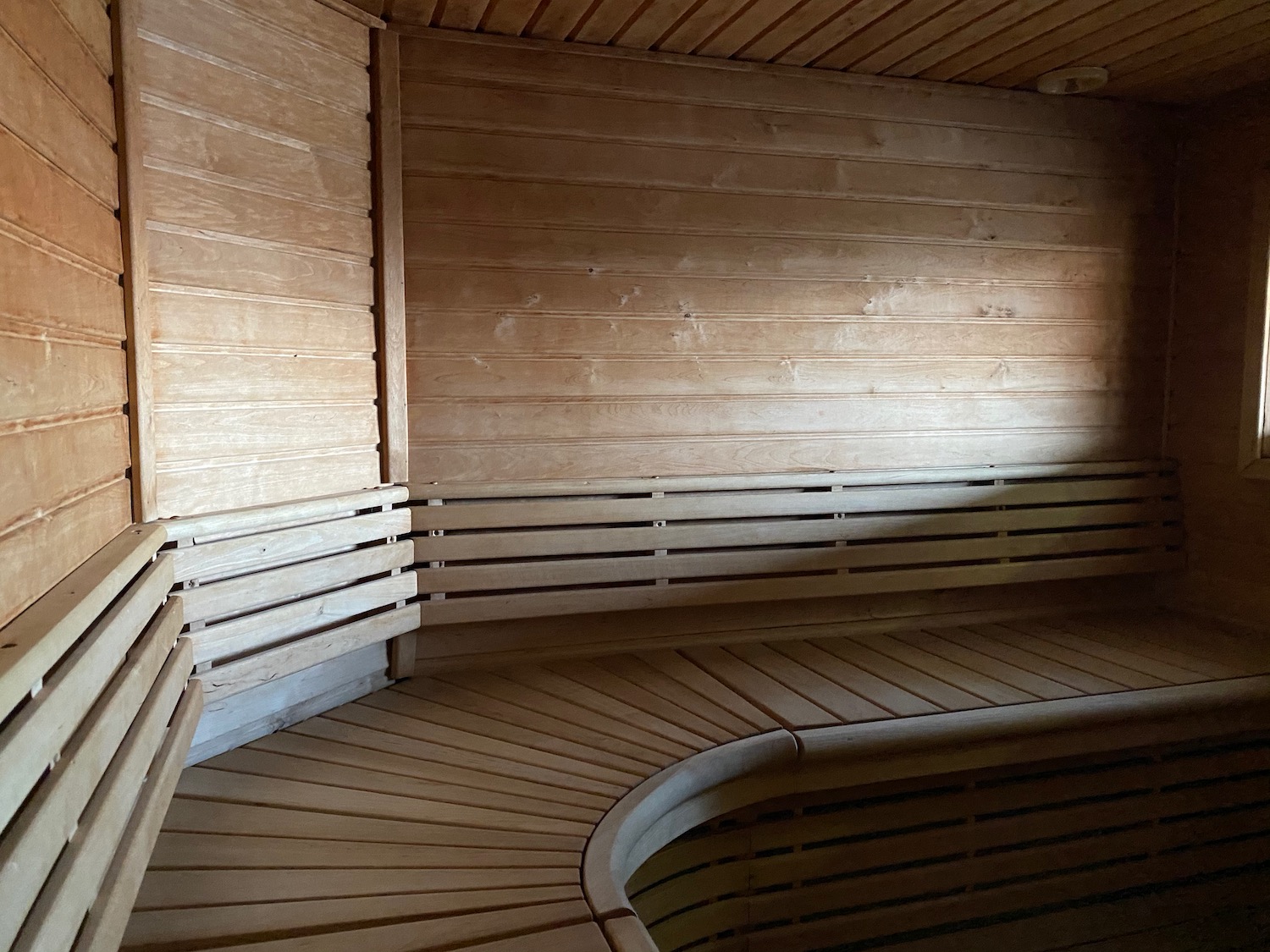 a wooden bench in a sauna