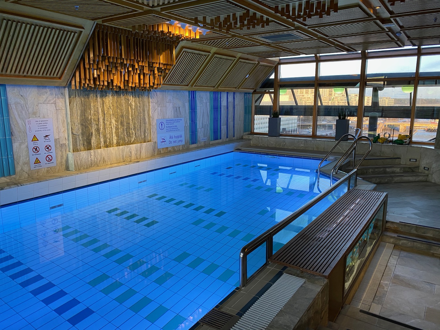 a swimming pool with a large window