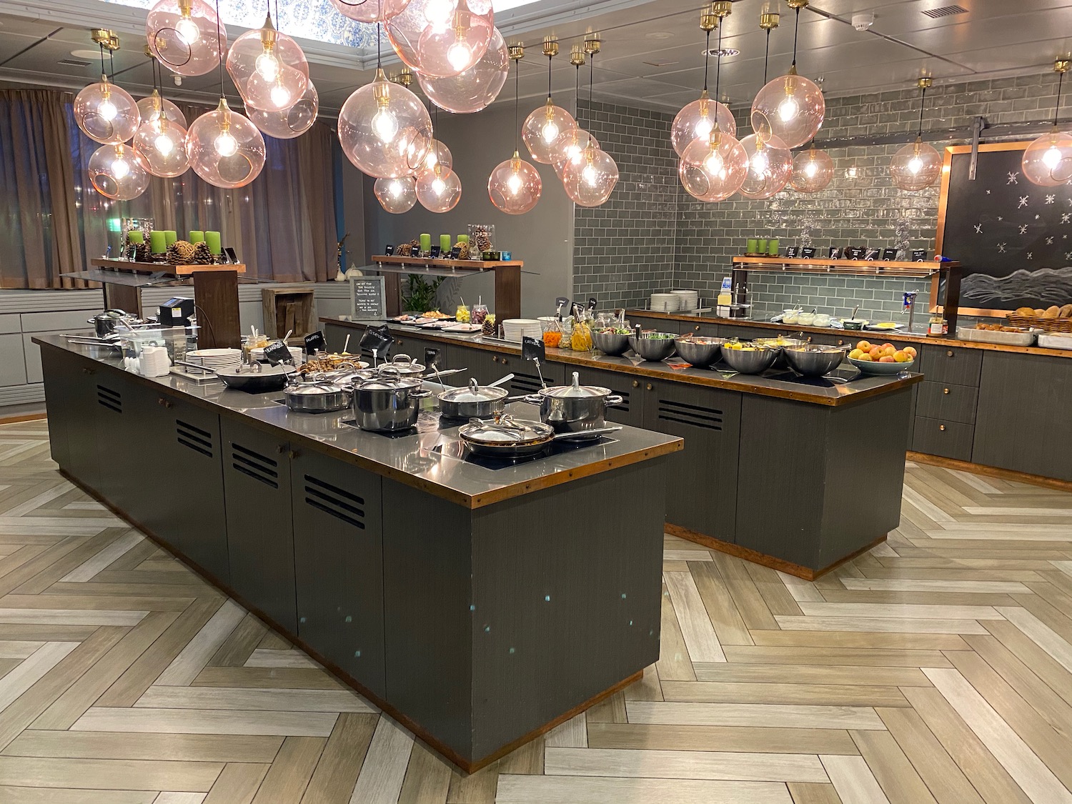 a kitchen with many pots and pans