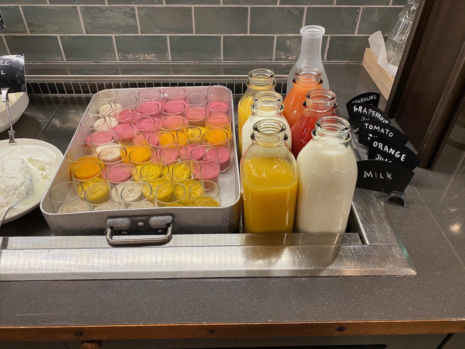 a tray of drinks and bottles