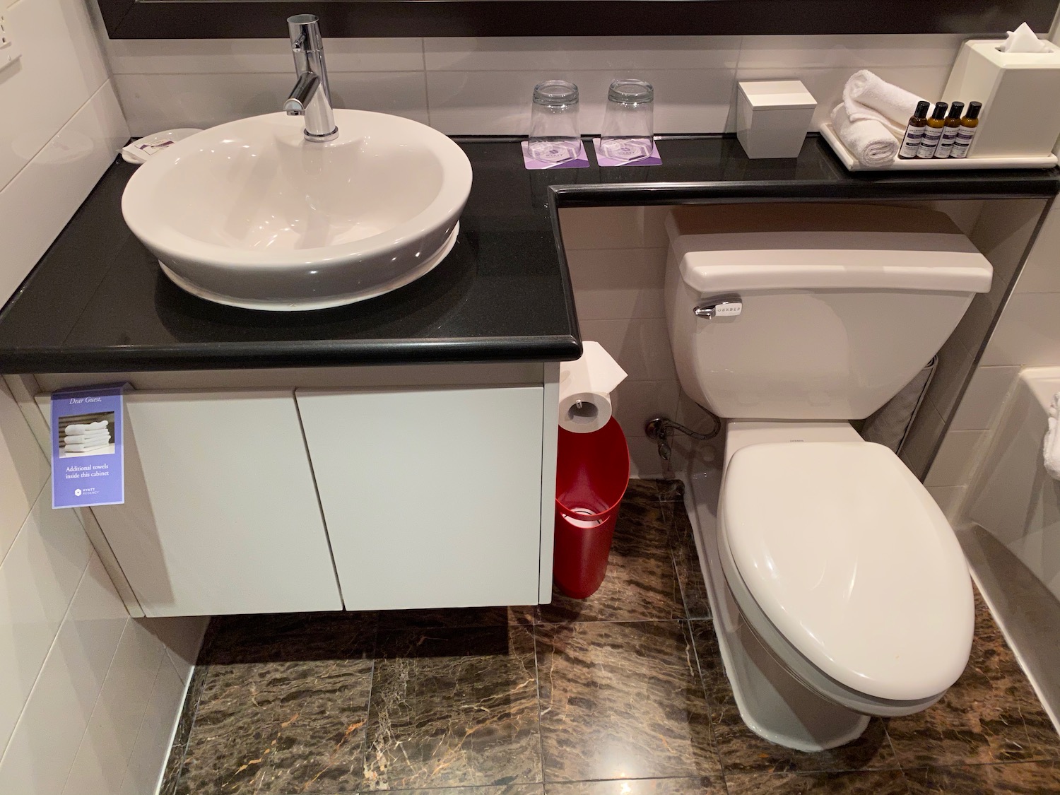 a bathroom with a sink and toilet