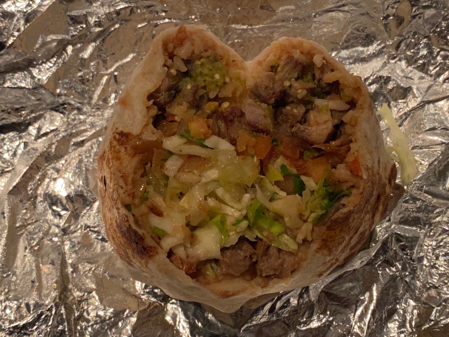 a burrito on a foil