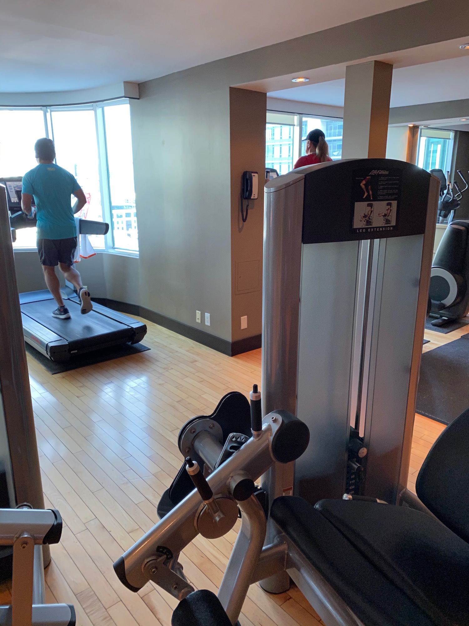 a man on a treadmill in a gym