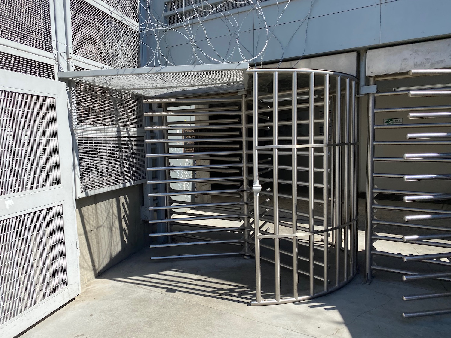 a metal cage outside a building