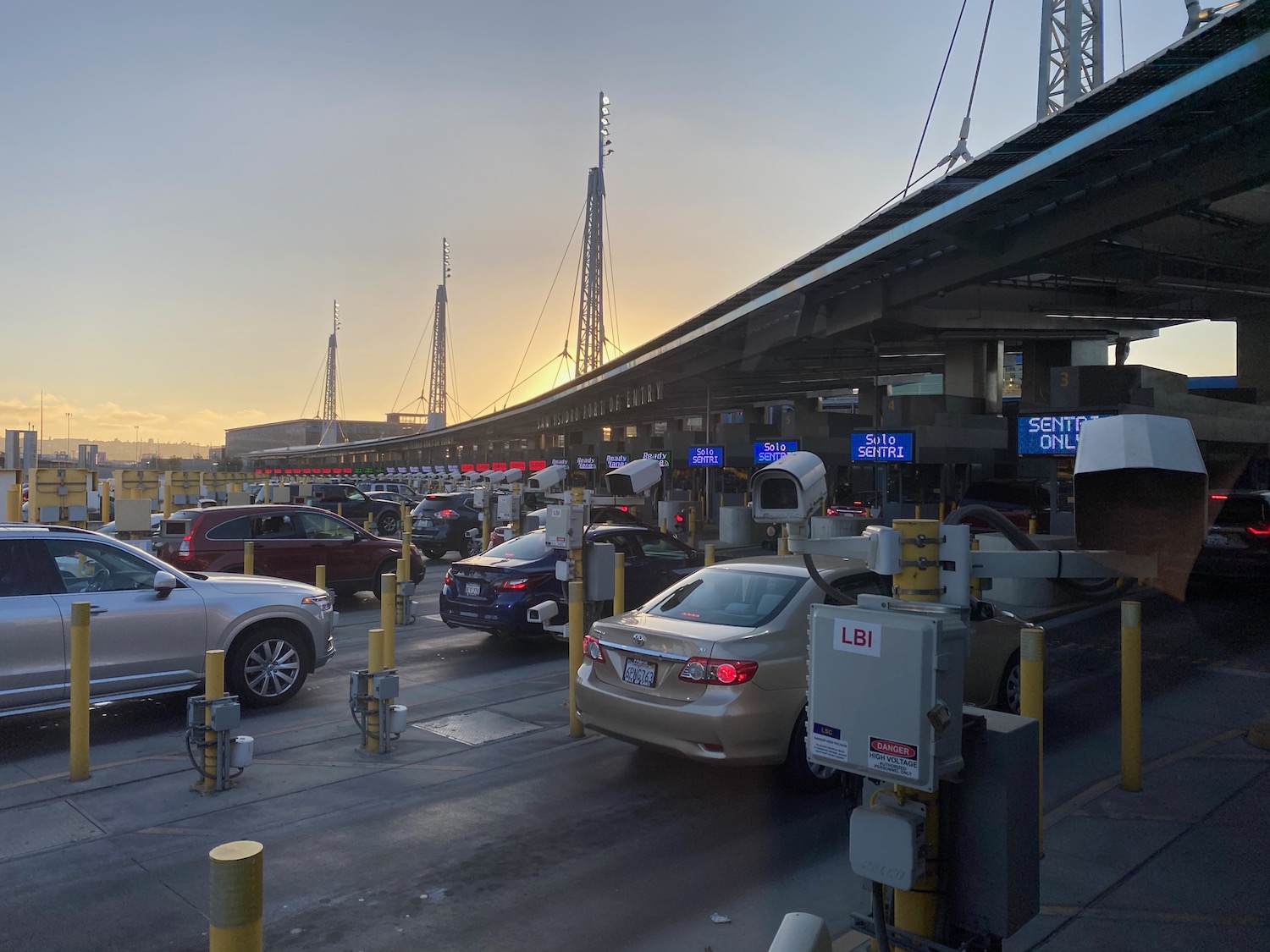 cars parked cars at a toll booth