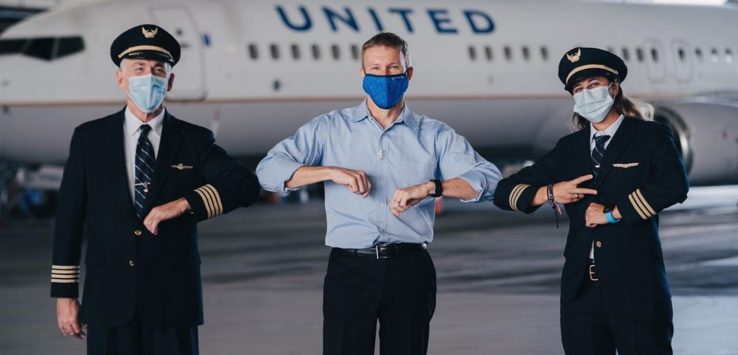 a group of people wearing face masks