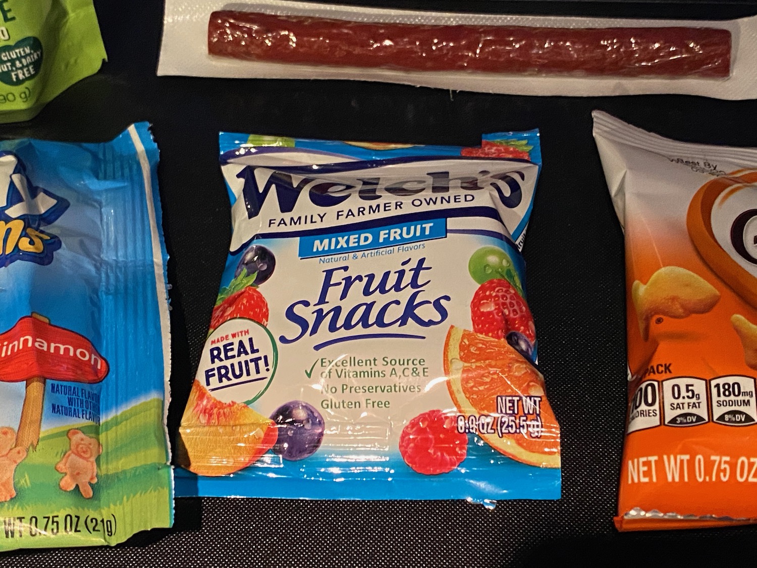 a group of packages of fruit snacks