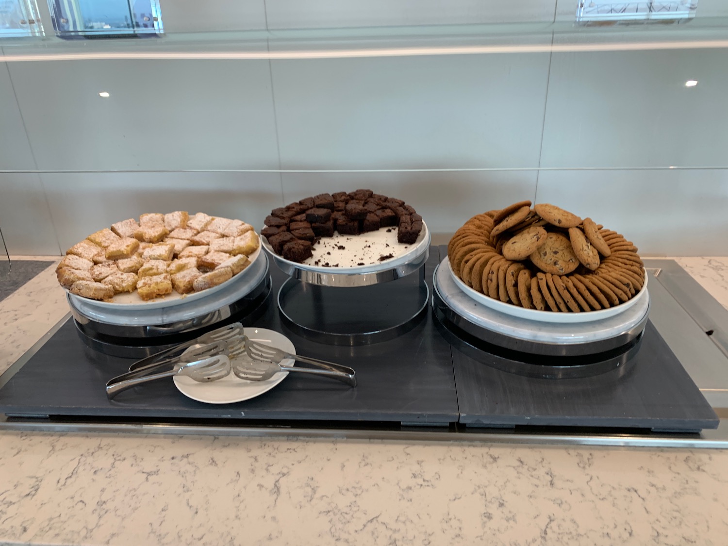 a group of cookies on plates