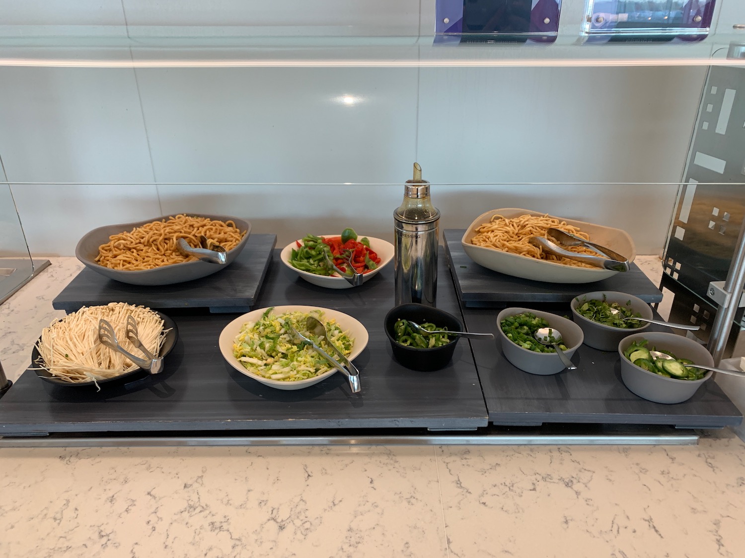 a group of bowls of food on a table