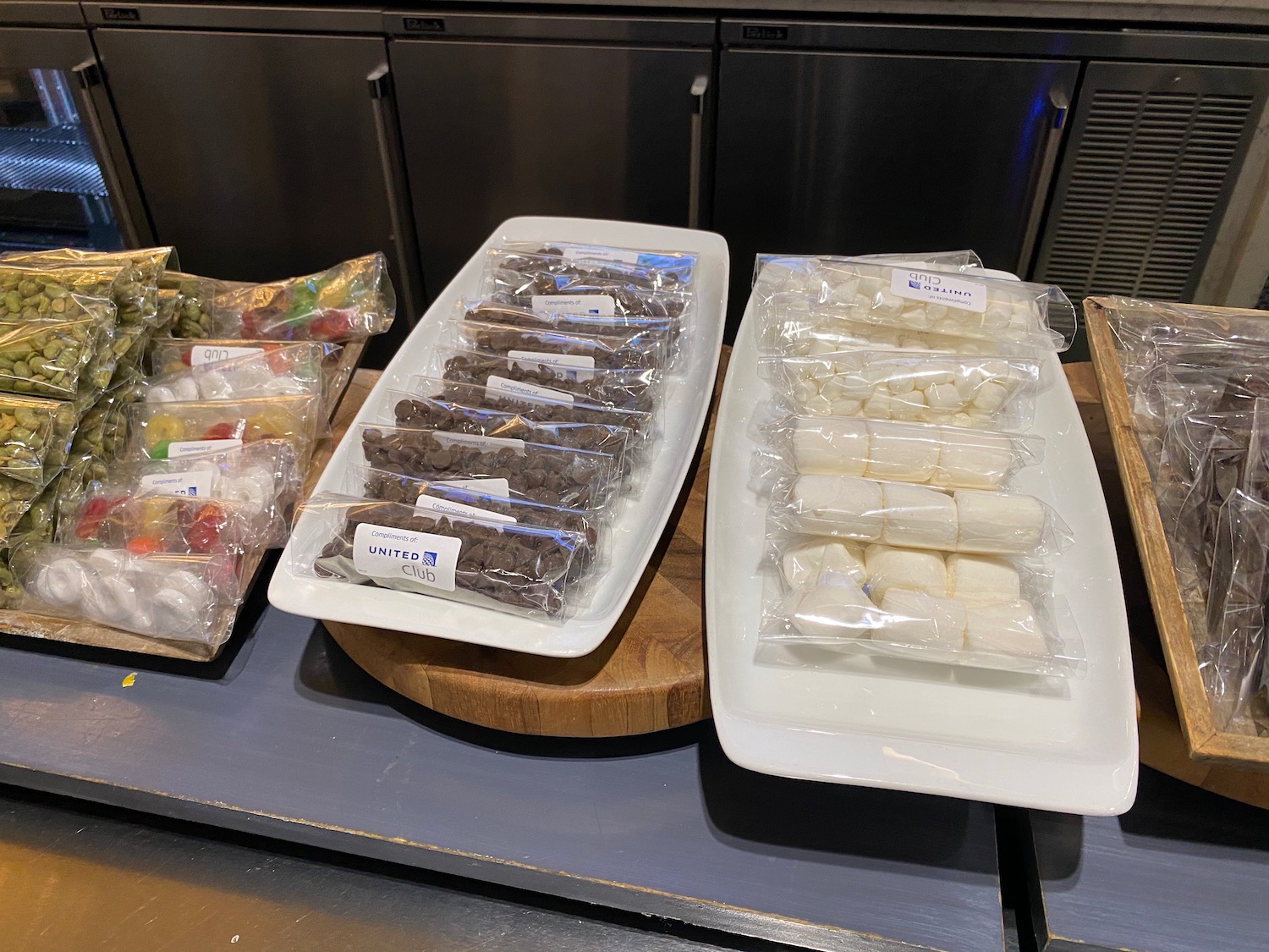 a group of plastic bags of food on a table