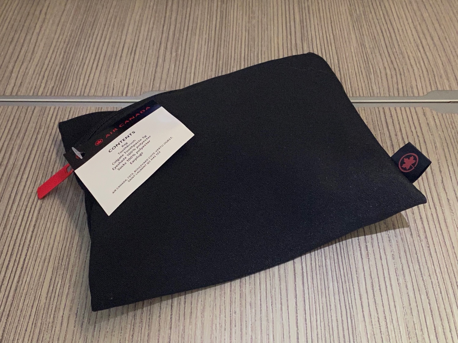 a black bag with a tag on it