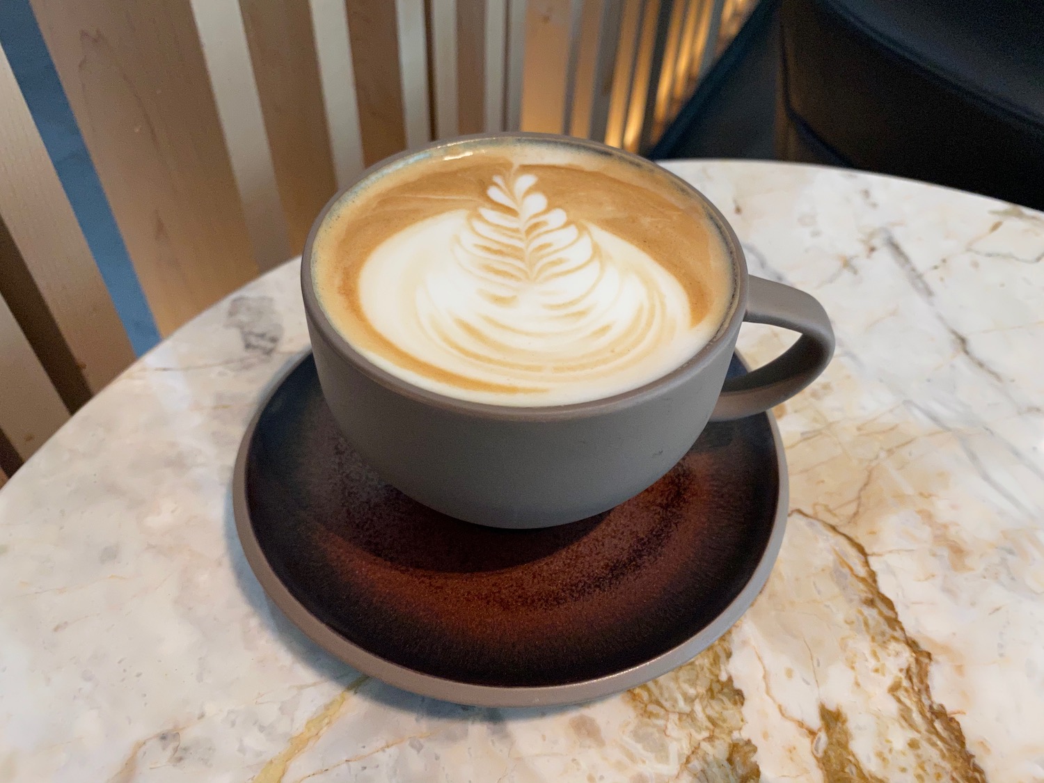 a cup of coffee on a saucer