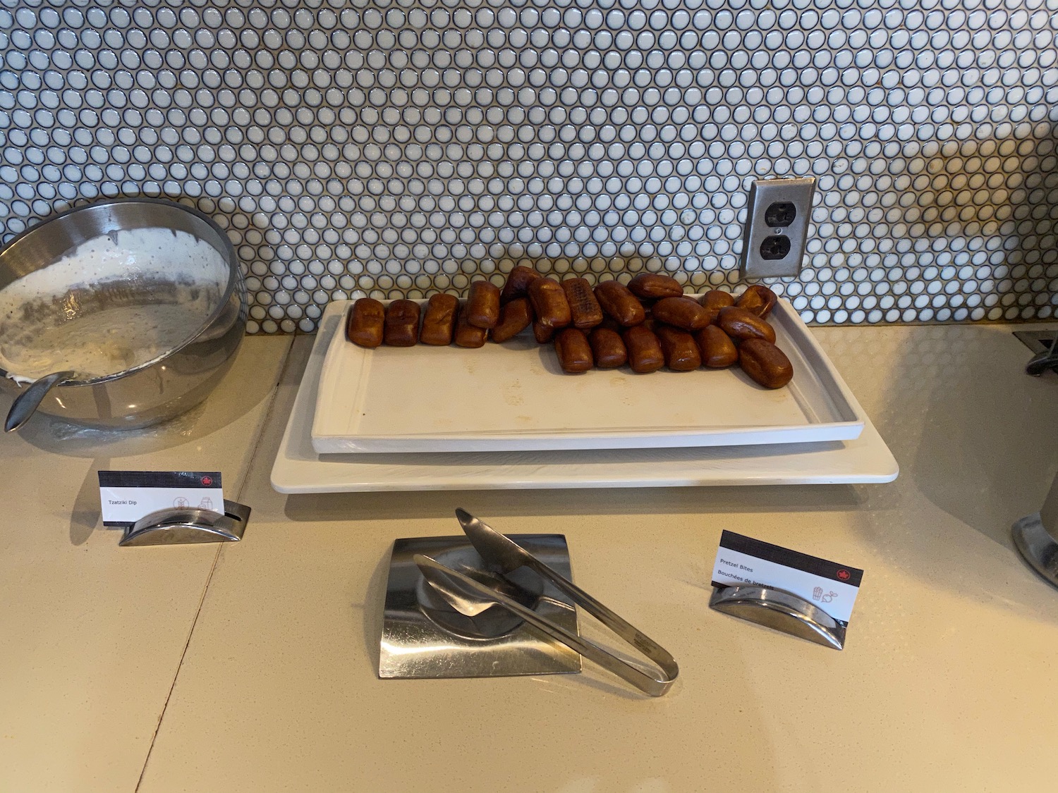 a plate of sausages on a counter
