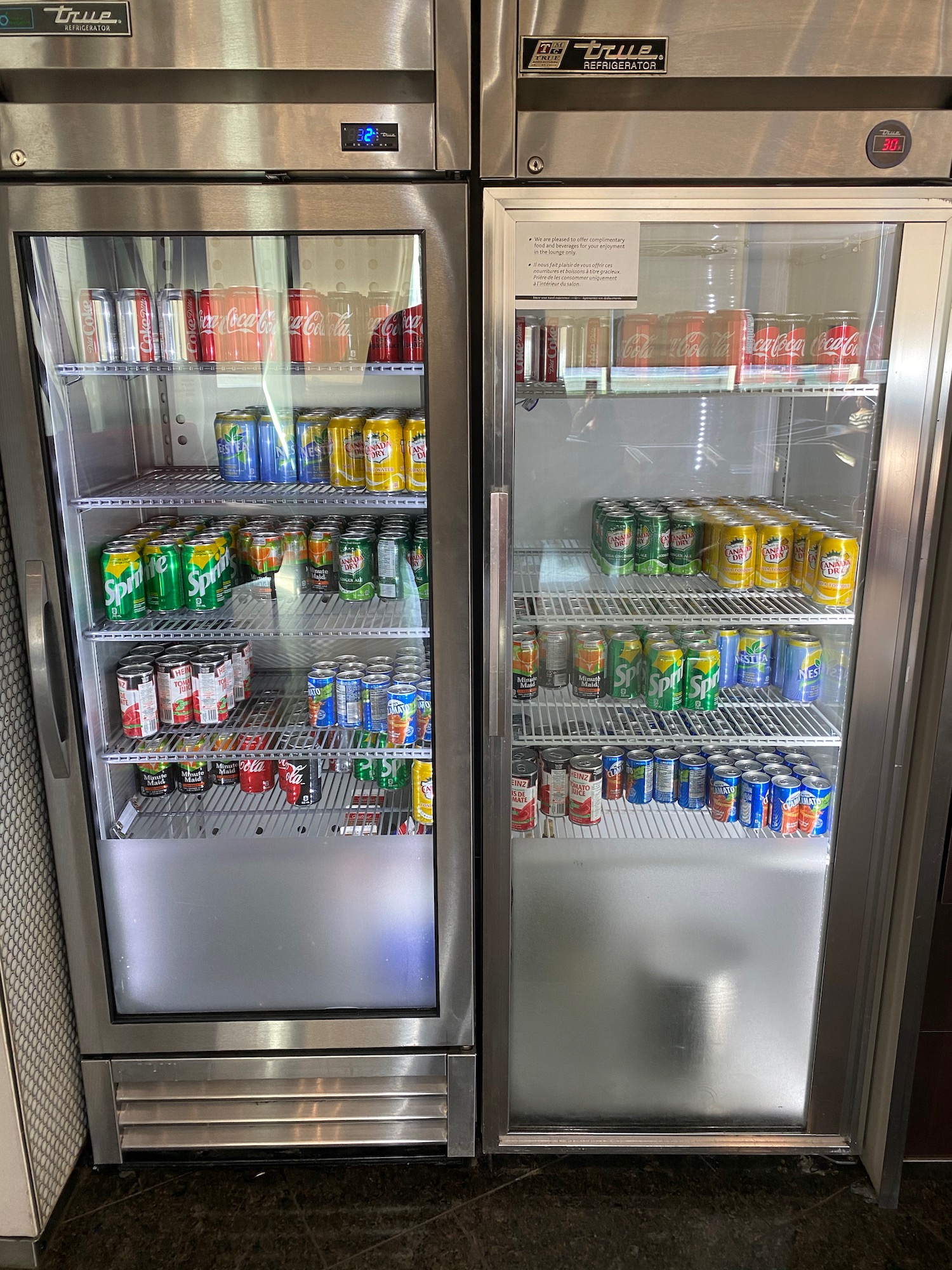 a refrigerator with cans of beer
