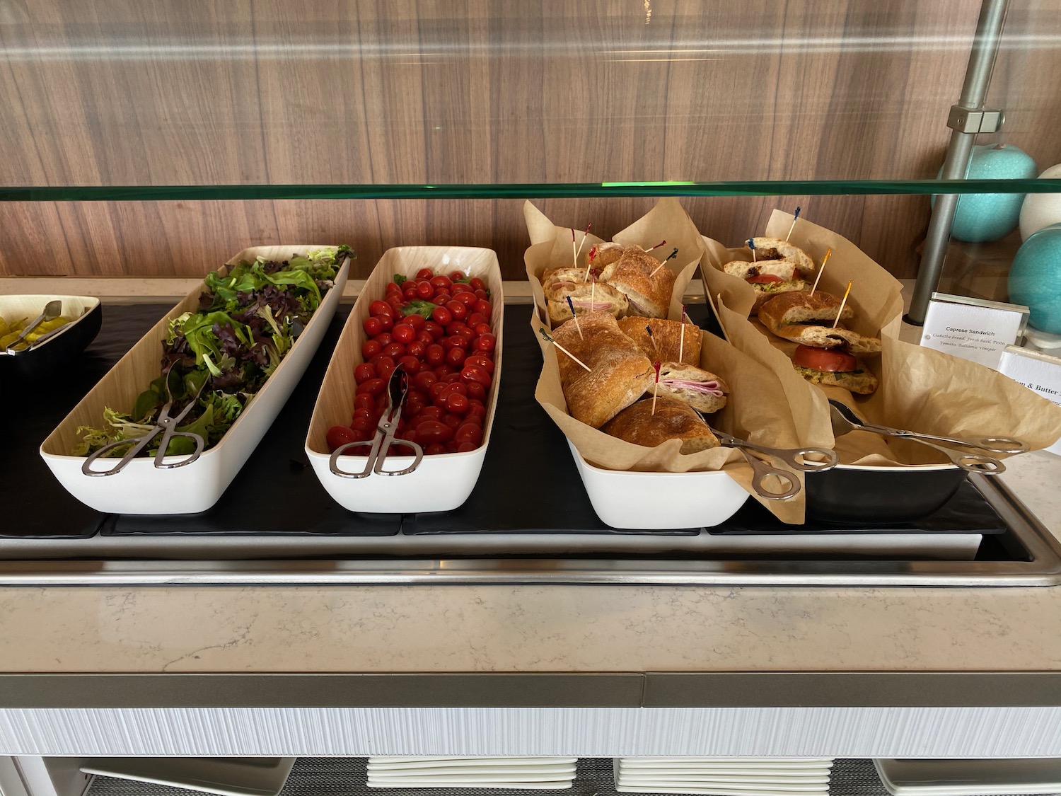 a buffet with food in containers