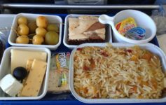 a tray of food on a plane