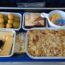 a tray of food on a plane