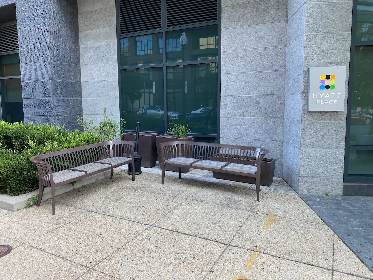 a group of benches outside of a building