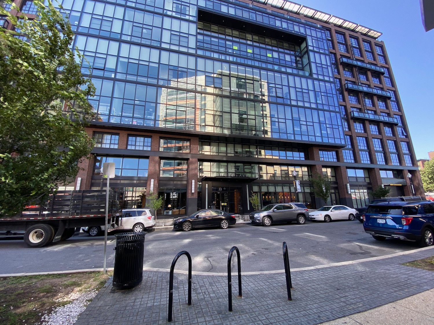 a building with cars parked in front of it