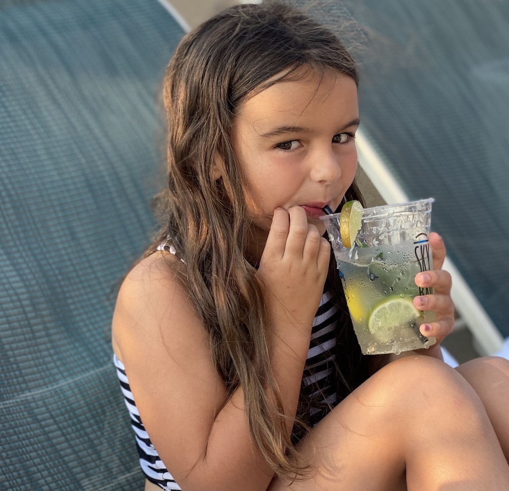 Lucy enjoying a fancy drink