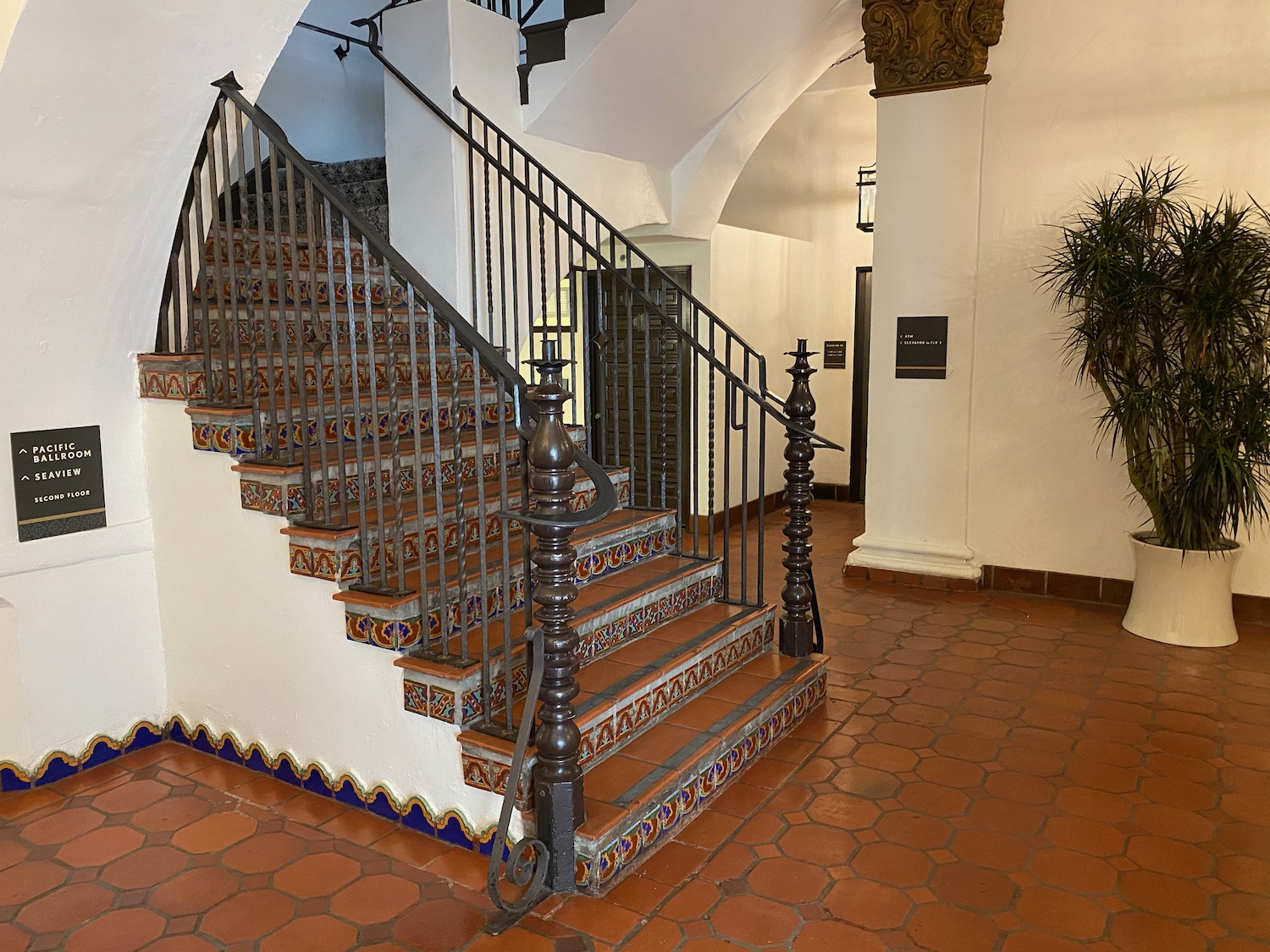 a staircase with a metal railing