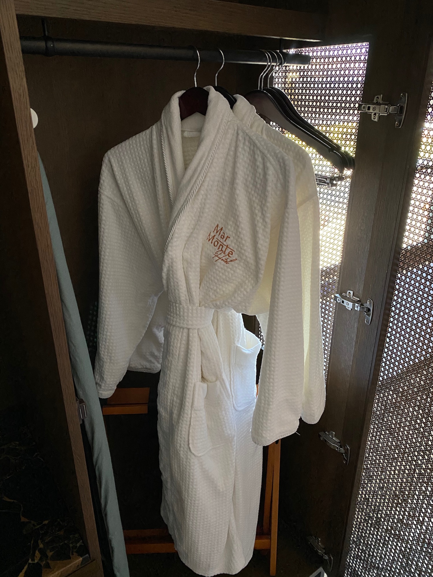 a white robe on a swinger