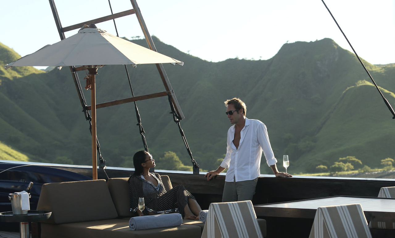 Relaxing on the deck of the Alila Purnama