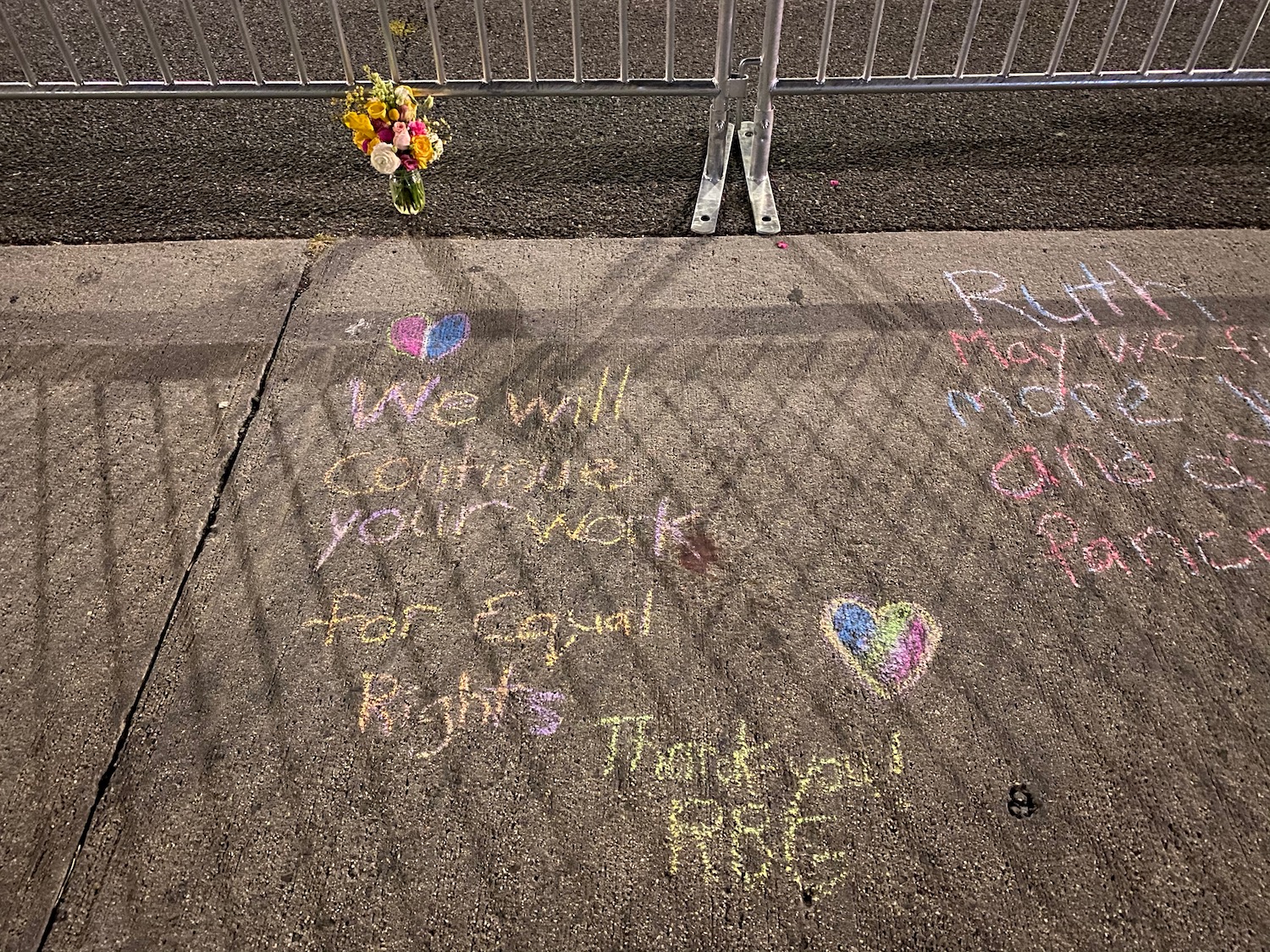 flowers and chalk on the ground