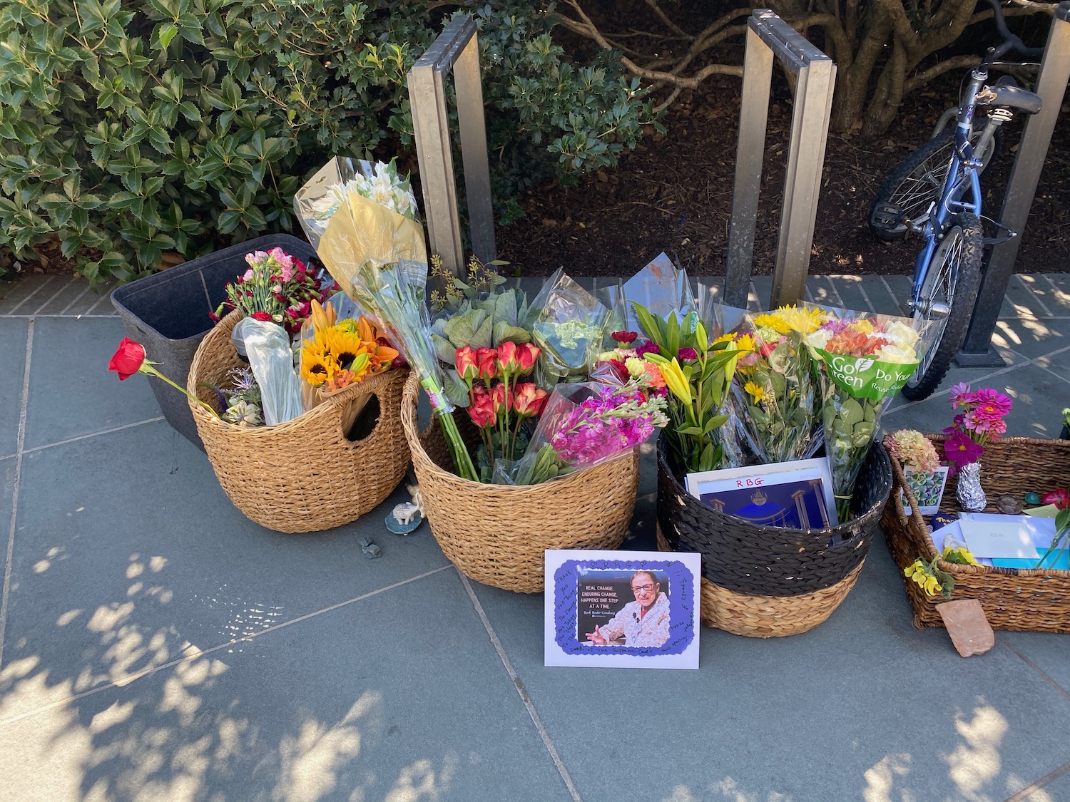 baskets of flowers and a picture of a man