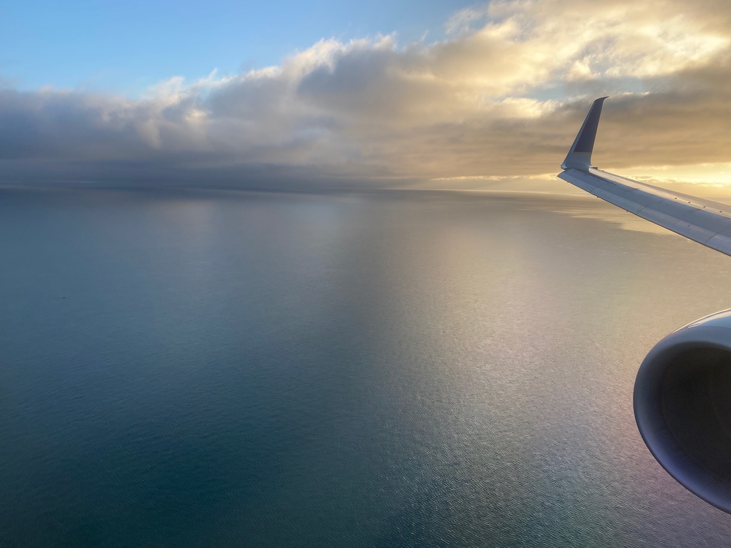 an airplane wing over water