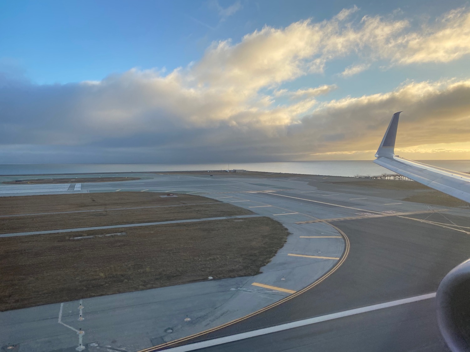 an airplane wing on a runway