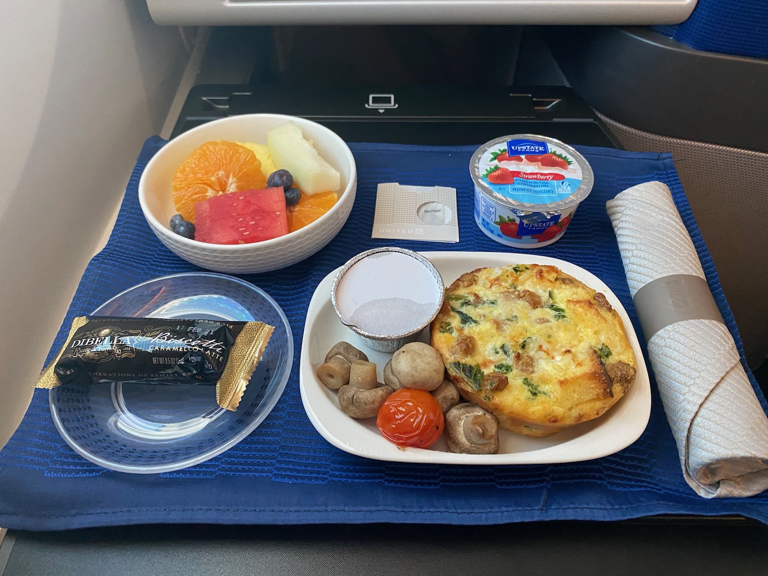 food on a tray on a blue cloth