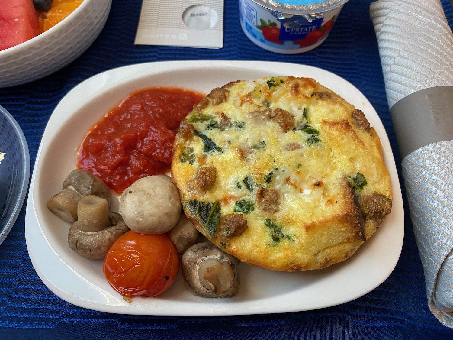 a plate of food with a fork and knife