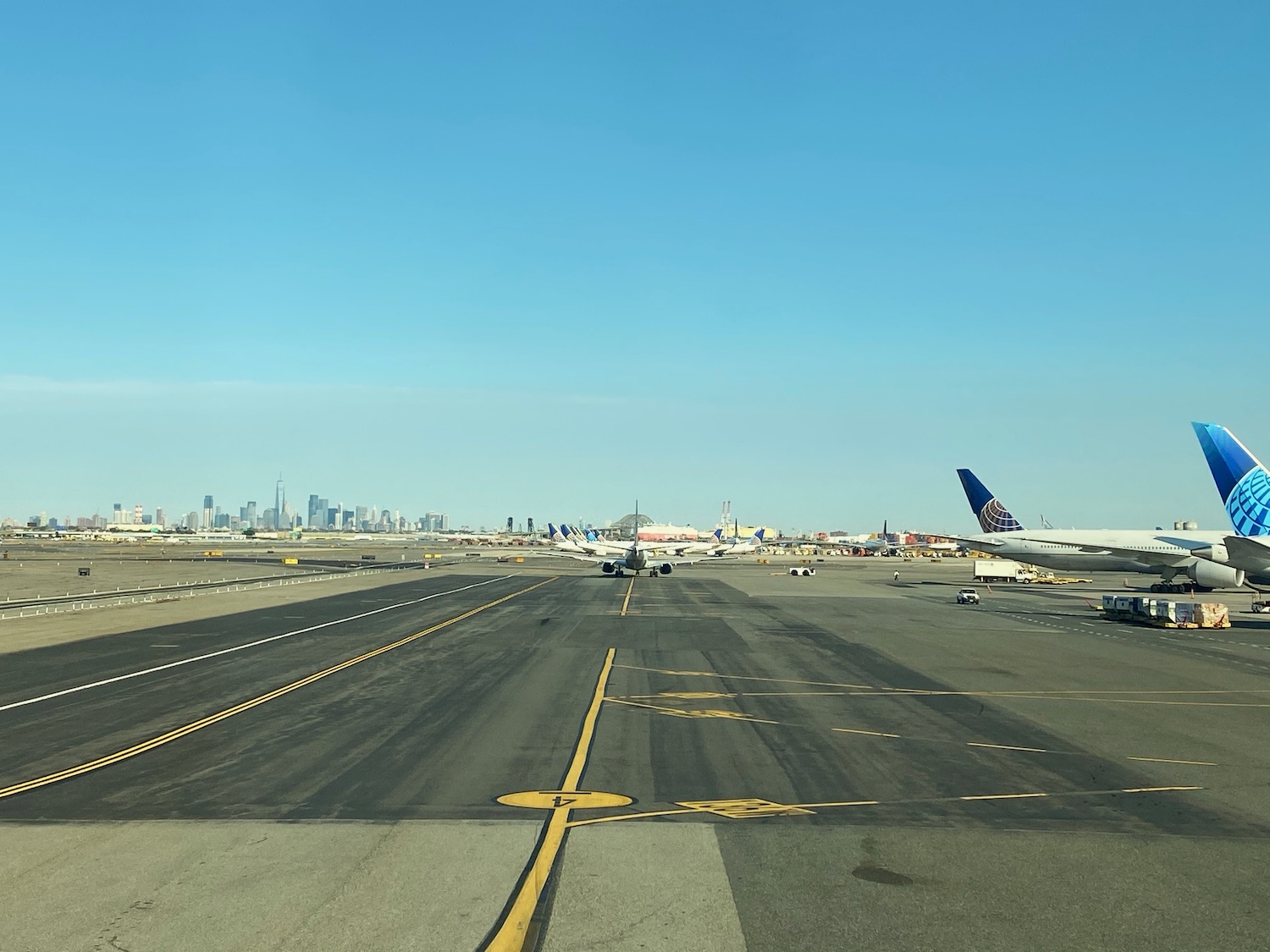 a runway with airplanes on it
