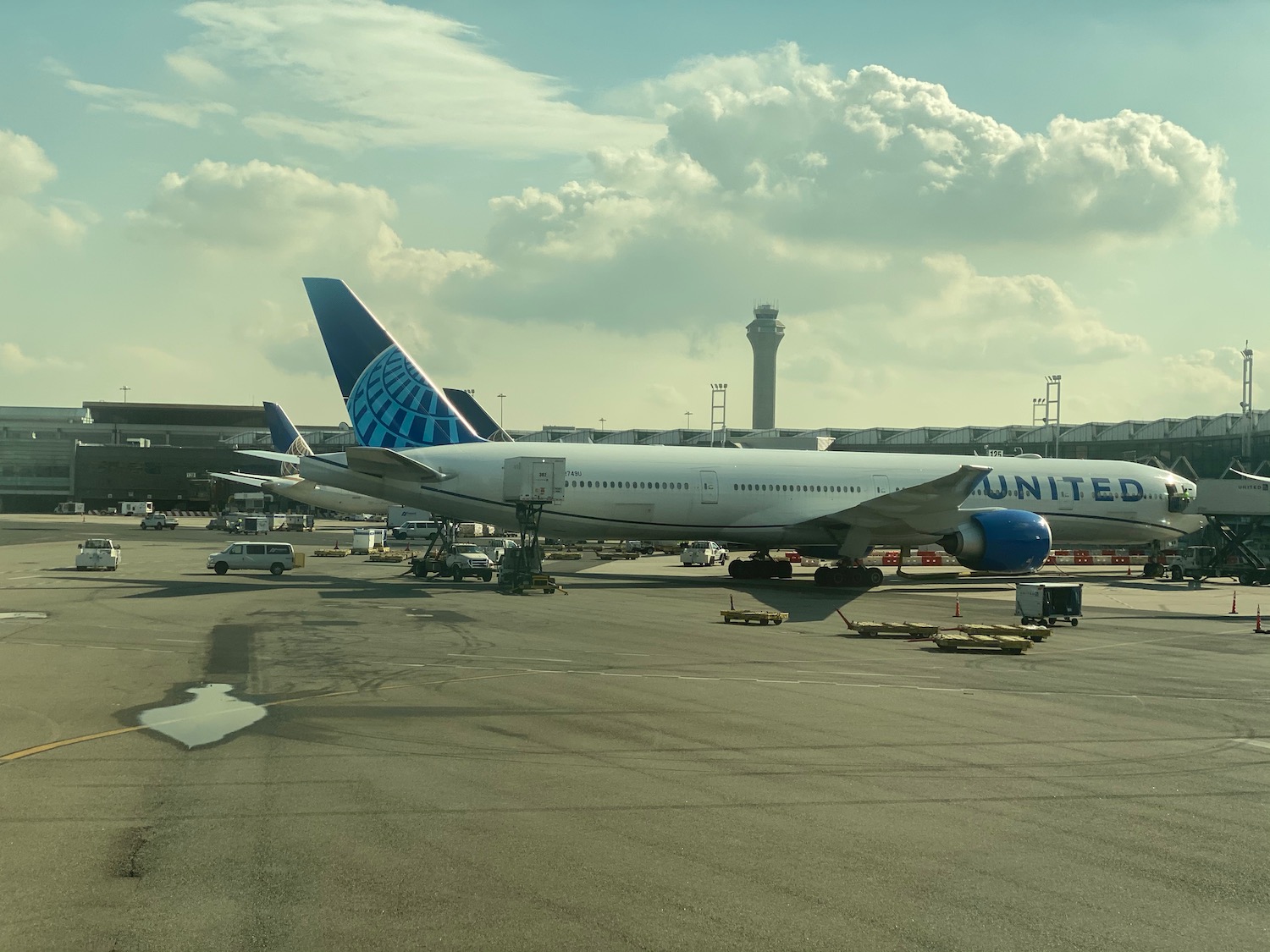 a large white airplane parked on a tarmac