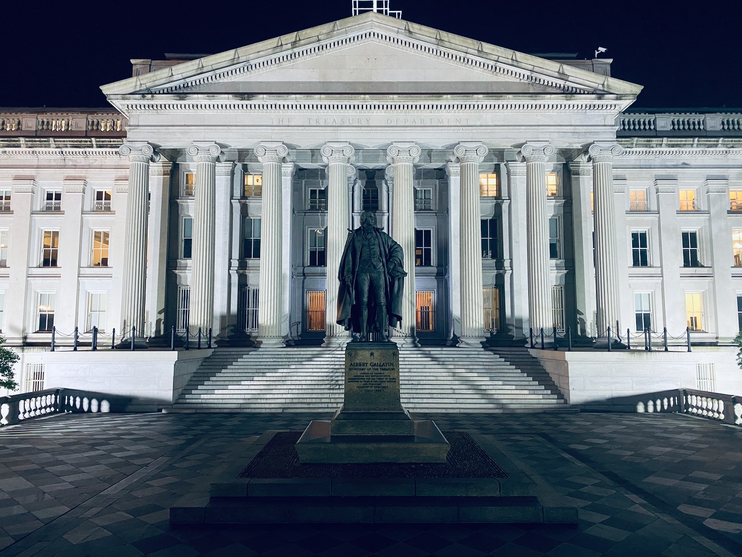 a statue in front of a building